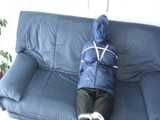 Get 3 classic archive videos with Katharina bound and gagged in shiny nylon rainwear