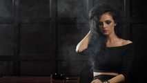 Gorgeous brunette Daria enjoying a cigarette in the hot smoking video
