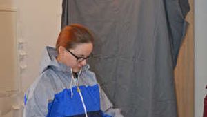 Lady Nadja in layers of AGU rainwear and and transparent raincoat