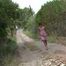 041003 Susana Tops Up The Puddle In The Lane