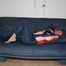 Katharina posing on the sofa wearing an oldschool down pants and down jacket (Pics)