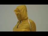 03:00 Min. video with Jill tied and gagged in a shiny nylon yellow rainsuit