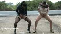 030051 Salma & Lucia Pee Together By The Side Of A Busy Road