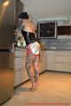 Sexy Francine in Lack Sportshorts (Sprinter) und Lacktop + Regenjacke (Exclusive Sportkleidung)