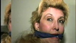 44 Yr OLD HOUSEKEEPER IS 44 Yr OLD HOUSEKEEPER IS BANDANA CLEAVE GAGGED, BALL-TIED & HANDGAGGED ON THE BED (D53-4)