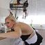 Busty blonde maid Cara cleans the kitchen