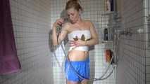 SEXY SANDRA in the shower with a sexy lightblue shiny nylon shorts and a top (Video)