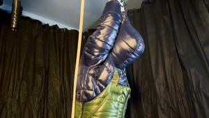 Sebastien tied by the hands in a down jacket.