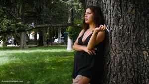 Good smoker Elmira is chain smoking all white 120mm cigarettes