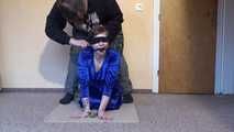 Sunny cuffed on the floor