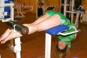 Leonie in an fitness studio wearing sexy shiny nylon shorts and a rain jakcet (Pics)