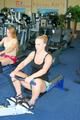 Katharina and Jenny during their workout in the fitness center wearing sexy shiny nylon shorts and tops (Pics)