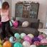 stomping 12inch balloons with Birkenstock shoe