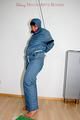Jill tied, gagged and hooded wearing a shiny blue downwear (Pics)