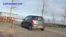 078014 Rachel Evans Pees Beside Her Car