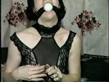 24 YR OLD GERMAN GIRL GRETCHEN, TAPE, TIES, HANDCUFFS, & GAGS HERSELF WITH HER WORN SMELLY PANTYHOSE & HELD IN WITH A BALL-GAG  (D48-16)