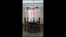 Selfbondage in full PVC outfit and transparent raincoat