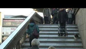 Alina walking on the street wearing a supersexy  down jacket and a jeans (Video)