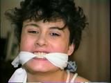 18 YR OLD LATINA CUTIE GETS MOUTH STUFFED WITH SPONGE, TIED IN WITH ROPE, PLASTIC WRAP STUFFED IN MOUTH, CLEAVE GAGGED, TIT TIED & HANDGAGGED  (D50-6)