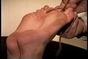 23 YR OLD AIRLINE FLIGHT ATTENDANT IS WRAP BONDAGE TAPE GAGGED, BAREFOOT, TOE-TIED, HOG-TIED, FOOT TICKLED, AND DUCT TAPE TIED STRUGGLING ON THE BED (D73-12)