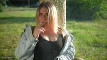 Nastya is smoking in the park