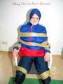 Katharina tied by using tape, gagged and hooded on a chair wearing sexy red/blue rainwear (Pics)