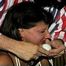 33 YEAR OLD AMERICAN INDIAN TRISH IS HANDCUFFED, MOUTH STUFFED, CLEAVE GAGGED, CHAIR TIED, BALL-GAGGED, HANDGAGGED WEARING LINGERIE, GARTER BELT, NYLONS & HEELS (D70-10)