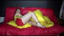 SEXY MARA ties and gagges herself with cuffs and a ball gag wearing a sexy red/yellow shiny nylon shorts and a sexy yellow top (Video)