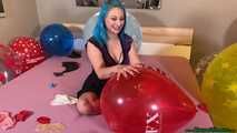 nail2pop big balloons on bed