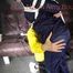 Sandra beeing tied and gagged by Stella in Shiny Nylon Rainwear crotchrope-suspended 