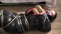 Ivette - tied in a sleepingbag