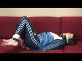 03:10 Min. video with Isabelle tied and gagged in shiny nylon clothes