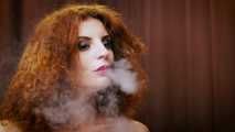 Wild and free girl Yuliya is definitely enjoying a strong 100mm black cigarette