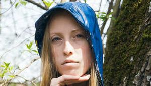 Better tank top or blue vinyl raincoat to combine?