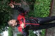 Watching sexy Sandra wearing a oldschool black/red shiny nylon rainwear combination while gardening outside (Pics)