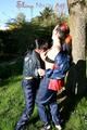 Jill and her friend in the garden playing with eachother wearing sexy shiny nylon rainwear (Pics)