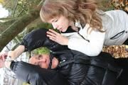 two of our archive girls bound and gagged in shiny nylon down jackets
