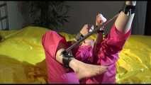 Get 2 Videos with Lucy bound and gagged in her shiny nylon Rainwear from our Archives