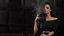 Gorgeous brunette Daria enjoying a cigarette in the hot smoking video