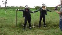 Jasmin & Larissa tied on fence Photoshoot