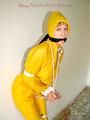 Leonie tied and gagged outdoor wearing shiny yellow rainwear (Pics)