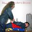 Jill tied and gagged by Petra bending over an commode bopth wearing sexy shiny nylon rainwear (Pics)