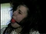 BALL-TIED, BALL-GAGGED HOSTAGE ERICA (D15-11)