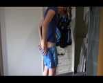 Watching Sonja coming home trying on several shiny nylon shorts to wear at home (Video)