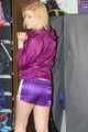 Pia enjoying a cupboard full of shiny nylon clothes trying on purple shiny nylon shorts and rain jacket (Pics)