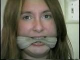 24 Yr OLD CRAFTER IS CLEAVE GAGGED, MOUTH STUFFED, HAND GAGGED, OTM GAGGED & TIED TO A CHAIR (D55-6)