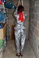 Nicole in an silver shiny PVC sauna suit tied and gagged in an cellar (Pics)