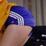 Sonja wearing a sexy blue shiny nylon shorts and a yellow rain jacket preparing her bed (Pics)