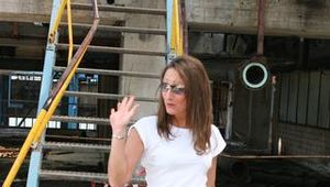 Stella posing outdoor on a stairway wearing sexy shiny nylon shorts (Pics)