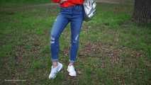 Pretty Kate is smoking Marlboro Red 100s in the park